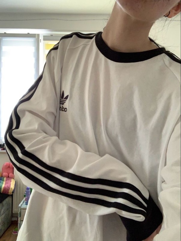 Create meme: adidas original suit, a girl in adidas without a face, adidas 