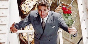 Create meme: Richard Gere with a rose, Richard Gere with flowers, Richard Gere pretty woman with flowers