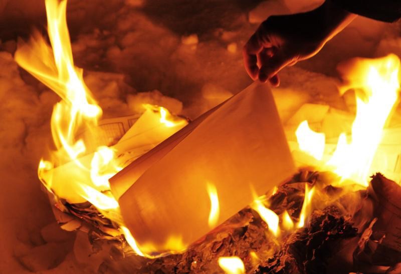 Create meme: burning paper, paper is burning, burning