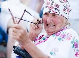 Create meme: age is bullshit the main thing is feelings, granny with a slingshot, pension 