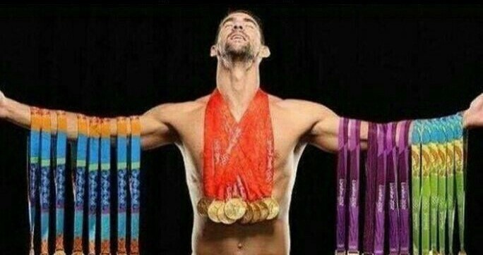 Create meme: Michael Phelps, Michael Phelps with medals, Michael Phelps Olympics 2021