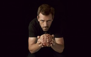 Create meme: Dr. house with a brain in his hands 