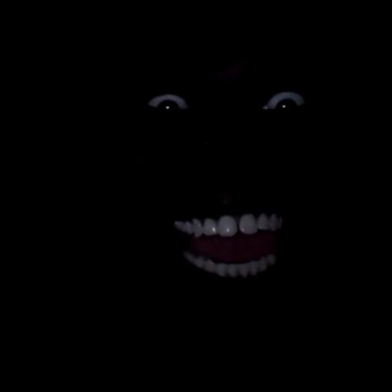 Create meme: eyes and teeth in the dark, Negro laughing in the dark, Negro in the dark with white teeth