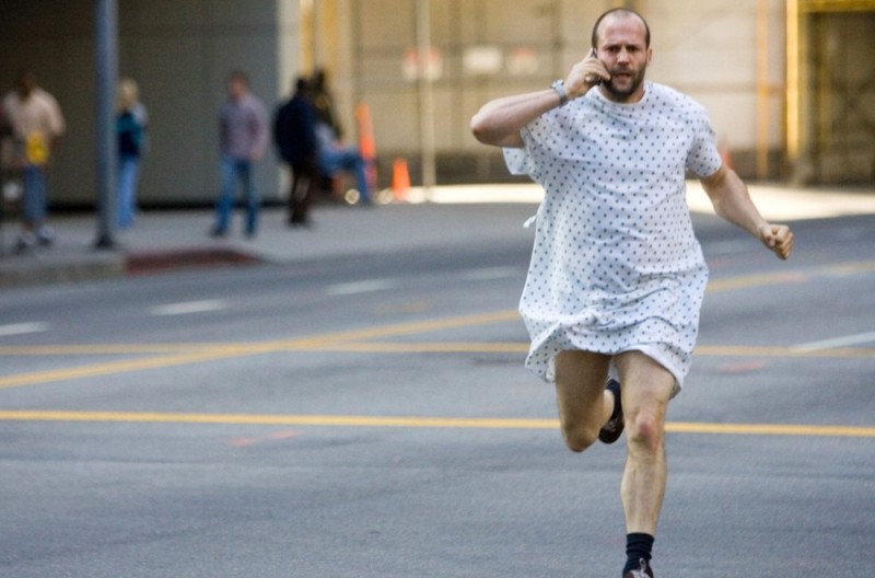 Create meme: Jason Statham runs in a bathrobe, Jason Statham runs, run 