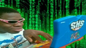 Создать мем: хакерман негр, негр хакер с игрушечным ноутбуком, негр хакер