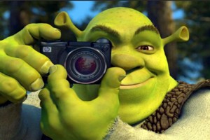 Create meme: Shrek, Shrek with camera, Shrek with a camera