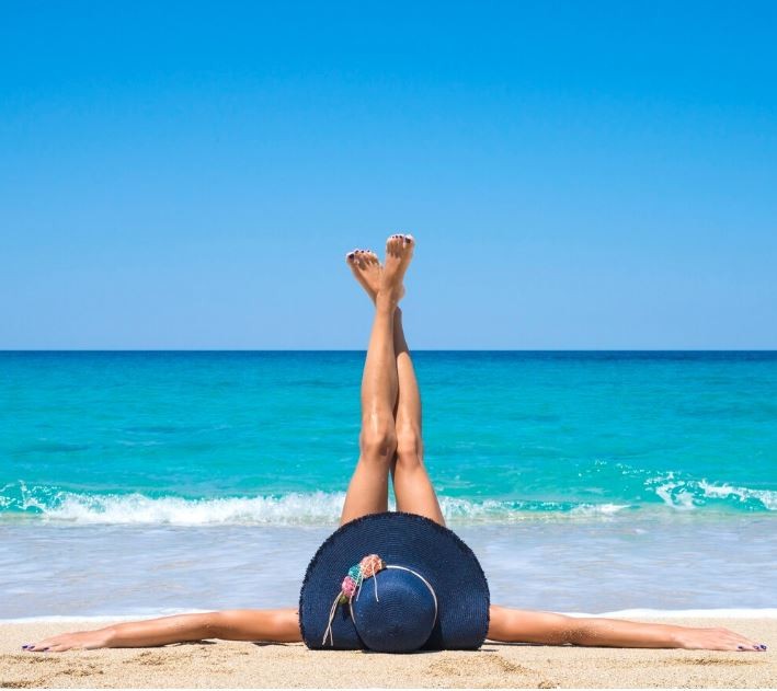 Create meme: fitness , feet , lying on the beach