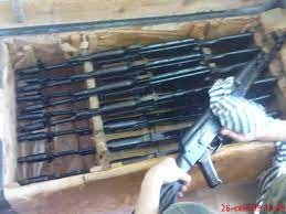 Create meme: a box with weapons, a box with kalashnikov assault rifles, ak74 submachine gun depot