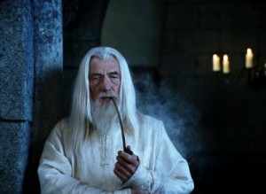 Create meme: Gandalf smokes a pipe