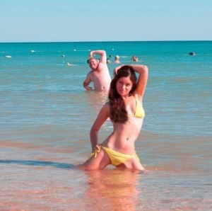 Create meme: girl, on the beach, the sea