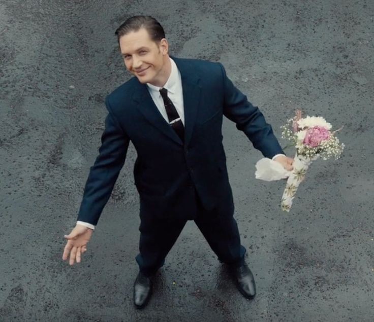 Create meme: Tom Hardy with a bouquet of memes, the legend movie with tom hardy flowers, tom hardy with a bouquet