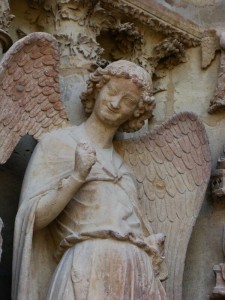 Create meme: Rheims Cathedral in France, the smiling angel, the Cathedral in Reims smiling angel, the architecture of the middle ages the smiling angel sculpture