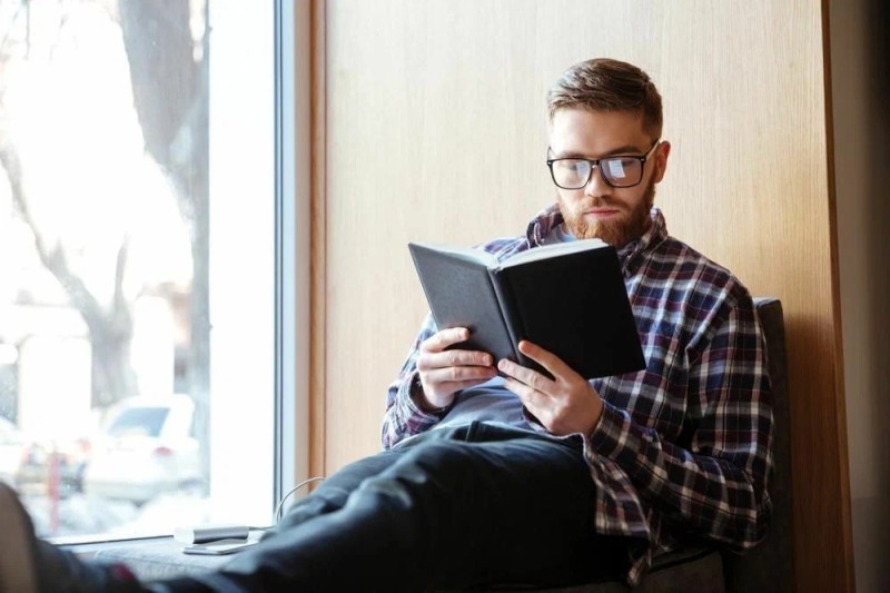 Create meme: a man reads a book, reading books , a man with a book