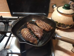 Create meme: cast iron skillet lodge square grill, lodge grill pan, steak fish on the grill pan
