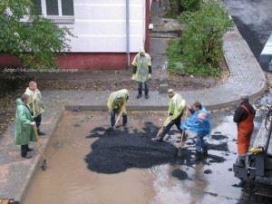 Create meme: laying asphalt in Germany, asphalt laying in puddles, asphalt laying