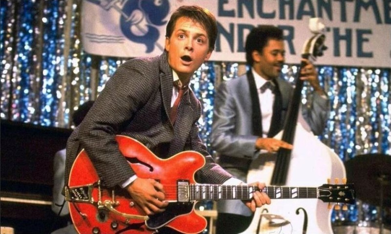 Create meme: michael J. Fox, johnny b. goode, Marty McFly with guitar