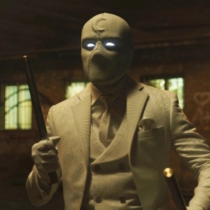 Создать мем: кадр из фильма, маска, деловой мужской костюм
