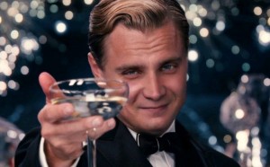 Create meme: DiCaprio with a glass of, Leonardo DiCaprio, DiCaprio raises a glass