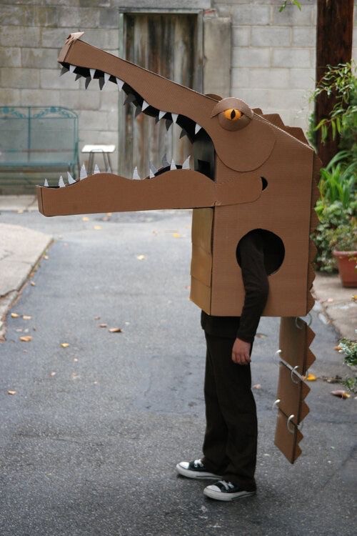 Create meme: creative costumes for children made of cardboard, dinosaur costume made of cardboard, cardboard suit for a boy