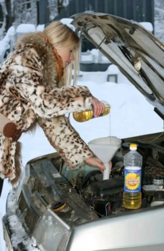 Create meme: a woman pours oil into a car, Engine oil is a joke, auto jokes