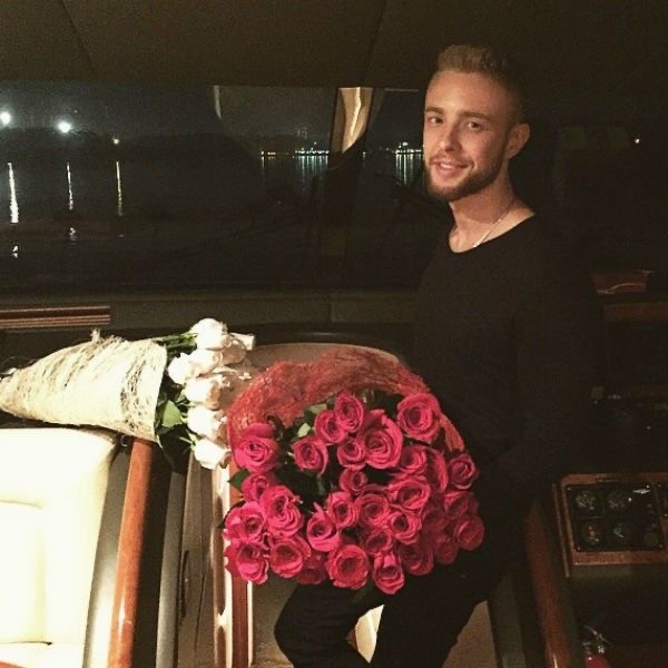Create meme: bachelor Egor Krid, egor creed with a bouquet, egor creed with a bouquet of roses