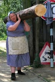 Create meme: woman log, russian woman with a log, there are women in Russian villages