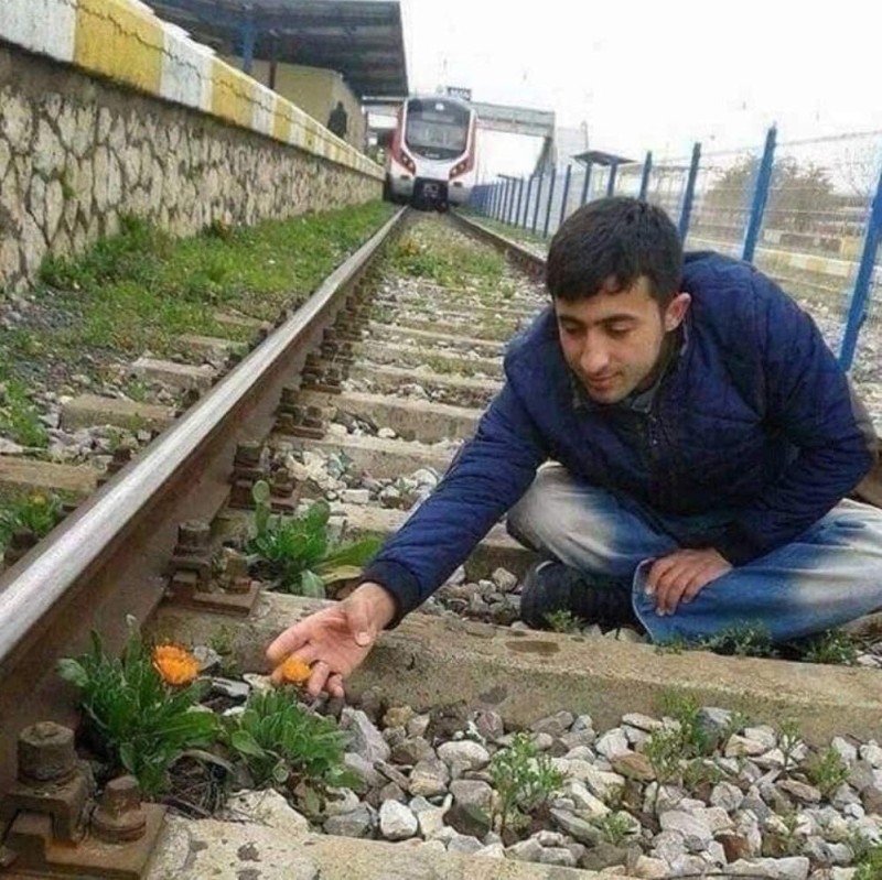 Create meme: The guy is sitting on the rails, Tajik on the rails meme, man joke