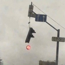 Create meme: traffic light , broken traffic light, the traffic light is hanging