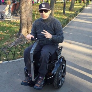 Create meme: Male, Gennady Kernes, Kernes is in a wheelchair