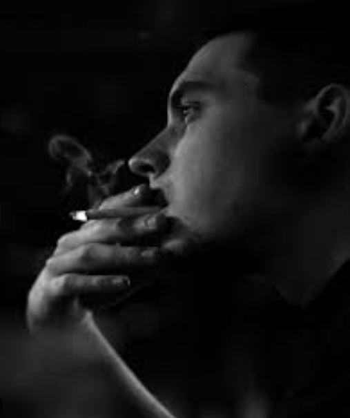 Create meme: with a cigarette, The guy is sad and smokes, sad man