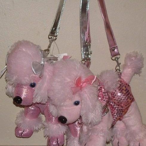 Create meme: A toy dog in a chichiel's purse, A soft toy pink dog, pink dog
