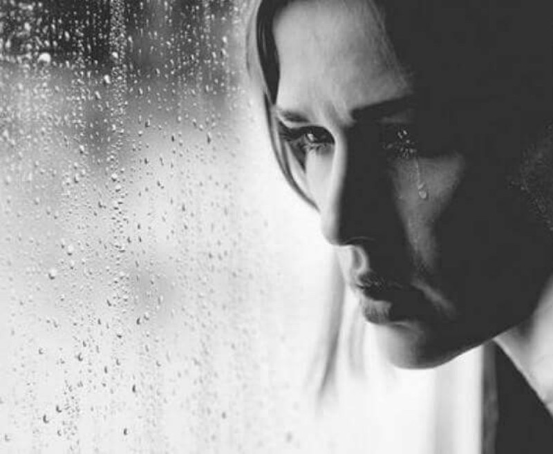 Create meme: a woman is crying at the window, a strong woman is crying at the window, tears of separation
