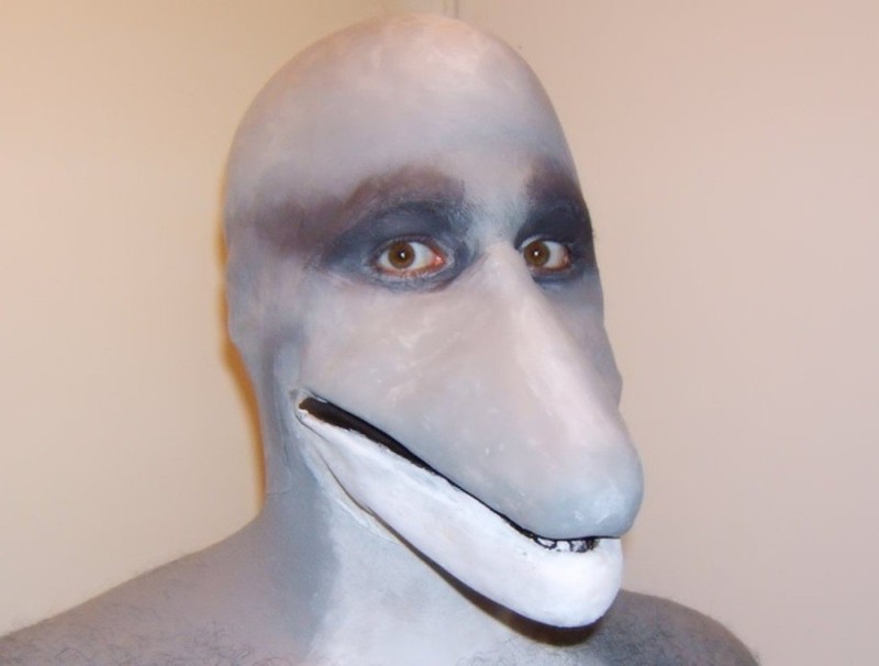 Create meme: dolphin mazl, scary dolphin, dolphin man