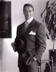 Create meme: Arnold Schwarzenegger in a suit, men's business suit, men's striped suit
