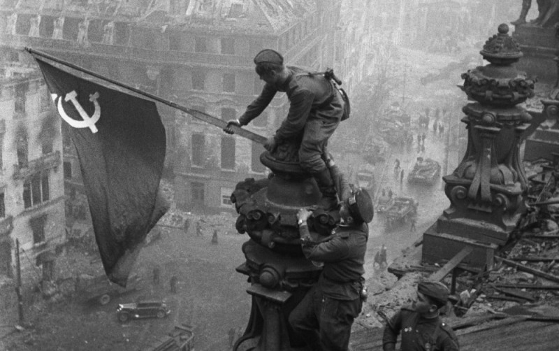 Create meme: hoisted the victory banner over the Reichstag , the victory banner over the Reichstag , the banner of victory over the Reichstag in Berlin