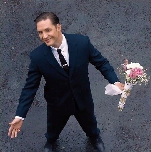 Create meme: tom hardy legend with flowers, the legend movie with tom hardy flowers, people 