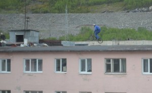 Create meme: Mistress jumps on a bike on the roof