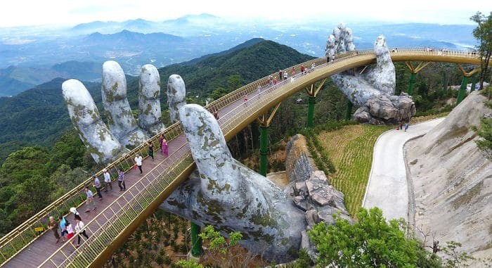 Create meme: vietnam golden bridge, golden bridge da nang vietnam, vietnam bridge