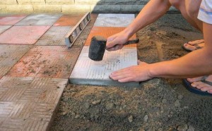Create meme: laying paving slabs on soil, brick paving on the site, how to lay paving tiles