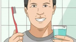 Создать мем: wikihow, мужчины, промывание рта водой