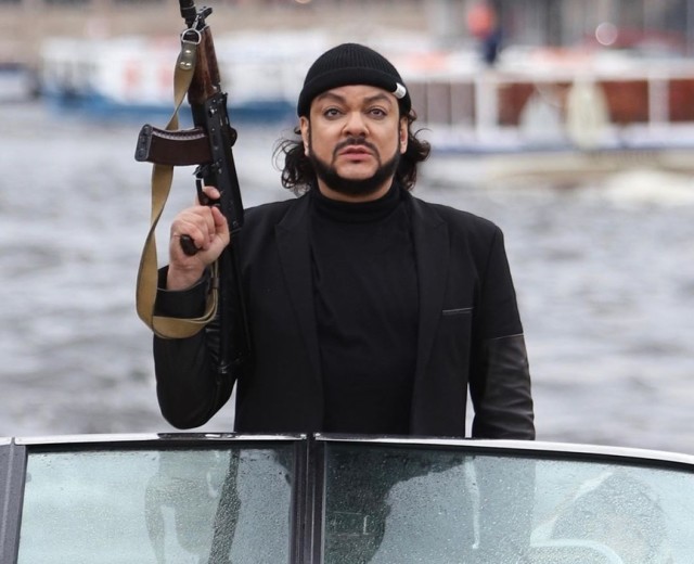 Create meme: Philip , kirkorov with a machine gun, the image of kirkorov