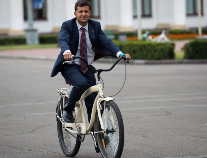 Create meme: to work by bike, Vladimir Zelensky is a servant of the people bicycle, on the bike 