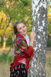 Create meme: girls, poses for a photo near the tree, birch, Russian beauty