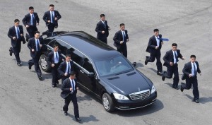 Create meme: personal security of Kim Jong-UN, car, security tuple Kim Jong-UN