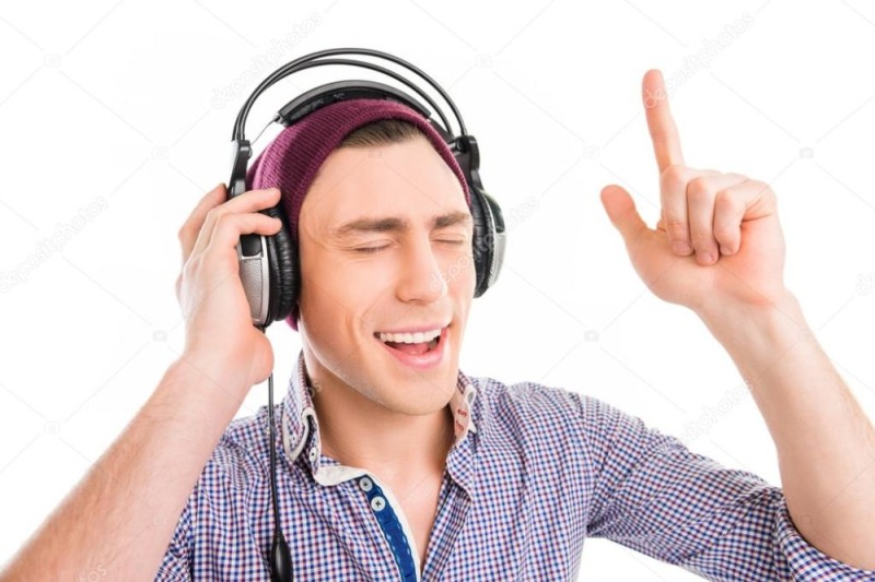 Create meme: the man in the earphones, listening to music on headphones, The man shows the headphones