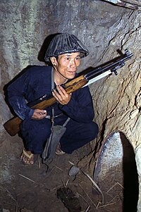 Создать мем: вьетконговцы, джонни они на деревьях, vietcong fist alpha