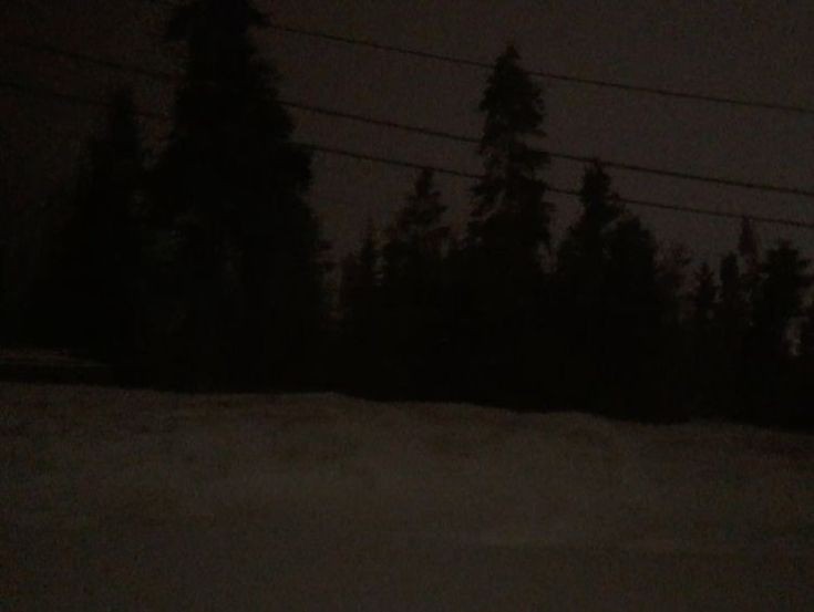 Создать мем: человек, снег в лесу ночью в границе, дорога