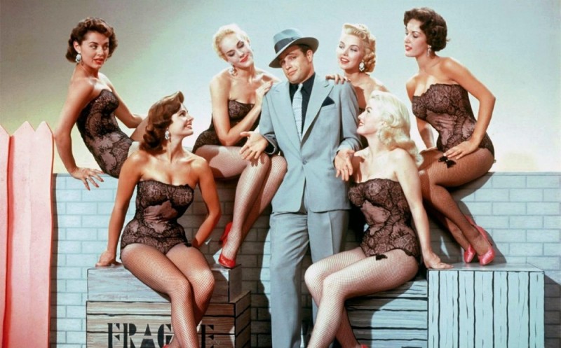 Create meme: Marilyn Monroe, a man surrounded by women, guys and dolls 1955 movie