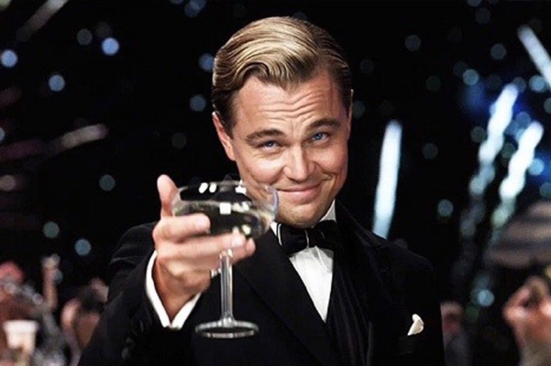 Create meme: the great Gatsby the glass , Leonardo DiCaprio the great Gatsby, Leonardo DiCaprio raises a glass