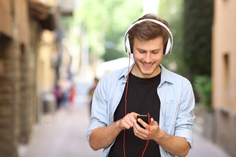 Create meme: the man in the earphones, the guy with the headphones, Teen wearing headphones